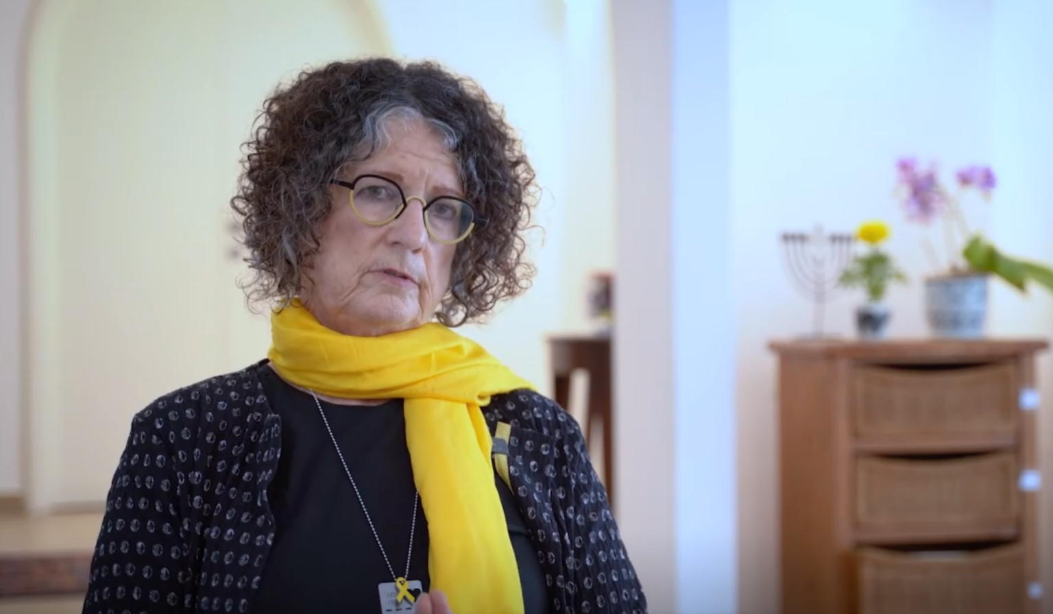 Former hostage Shoshan Haran speaks about being taken captive in video for an Open University award on May 29, 2025 (Courtesy)